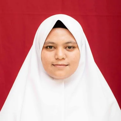 Tutor Edufio Juli H., Fisika UGM, mengajar di Sinduadi